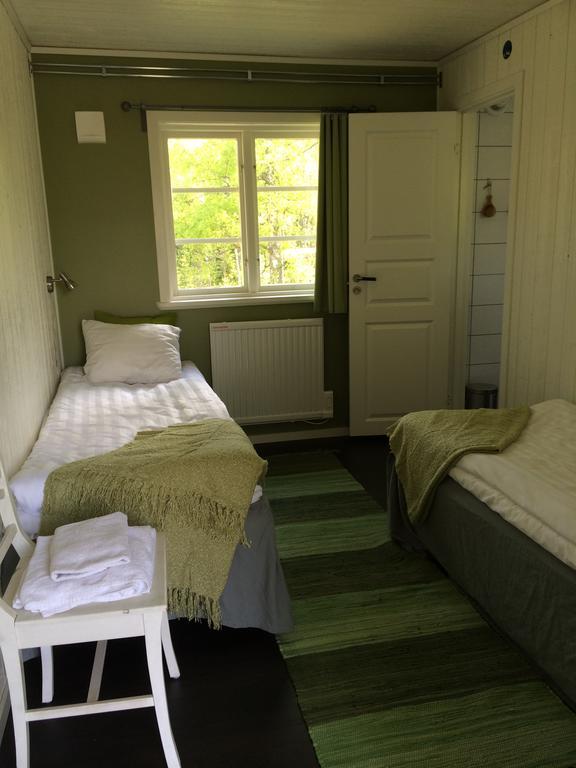 Oesjoenaes Hotel Tived Екстериор снимка